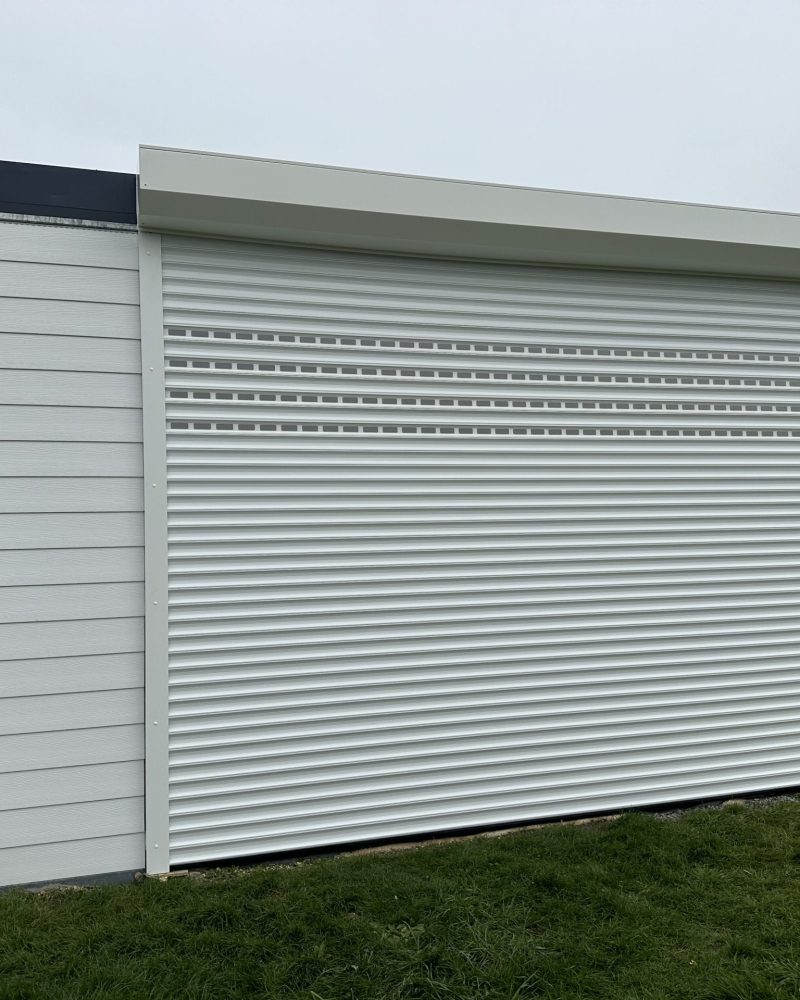 Réalisation porte de garage, Lamy Pascal, menuisier à Château-Thébaud.